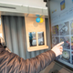 A shopper placing an order at an automated supermarket without employees in Germany